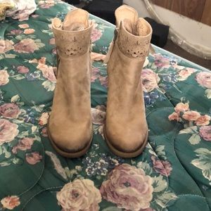 Size 7.5 boots, rubber heels.